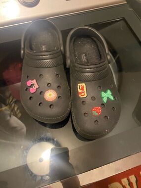 CROCS Black Kids Slip-On Clogs with Colorful Charm Accents